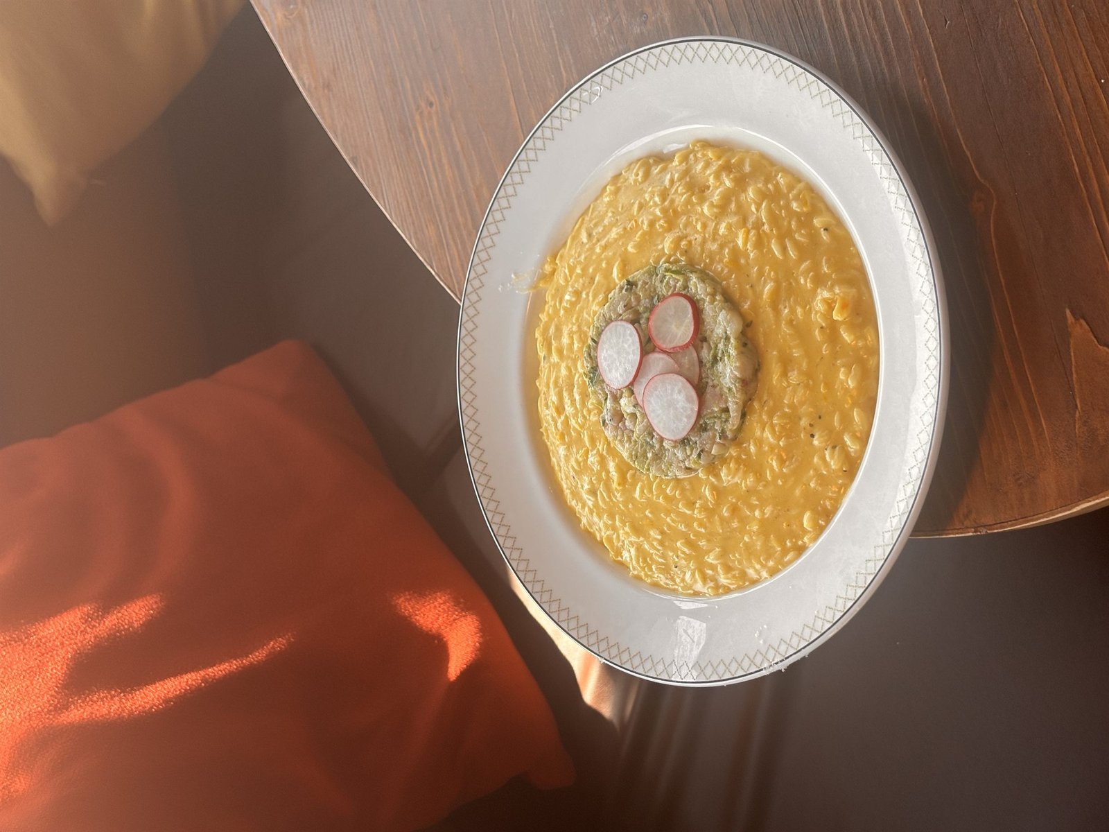 Saffron risotto with seabass tartare and radish